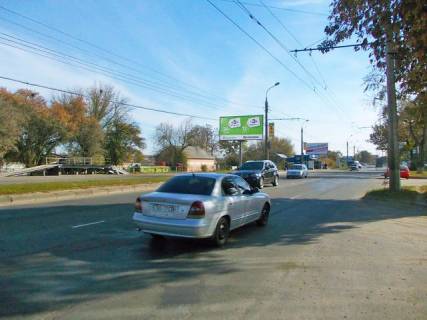 Billboard B in Sumi, 6x3  Bilopil's'kij Slah ,18 (DAI) (magazin "Avtozapcastini", AZS "Marsal", AZS "Avias") v centr Photo 1