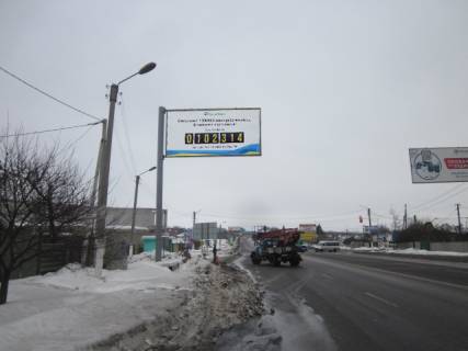 Billboard B in Pisochin, 6x3  Poltavs'kij slah u - pos. Pesocin - post DAI (Harkiv - Kiiv - pos. Pesocin)  viizd z Harkova Photo 1