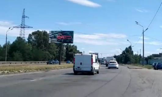 Video Billboard A in Kyiv, 6x3  Bogatirs'ka 1A, (rozpodiluvac), Avtosalon Mitsubishi/Peugeot,  ruh v napramku Petrivki - 337350 scheme