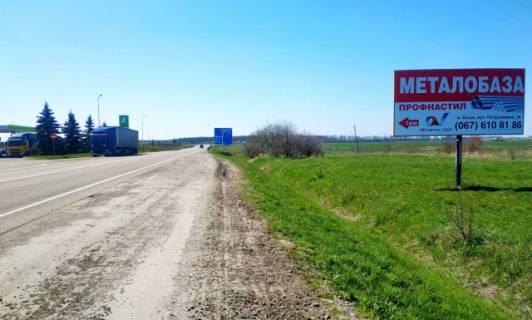 Billboard A in Busk, 6x3м.  m. Bus'k, porad AZK OKKO, viizd z mista v storonu m. L'viv + ves' transport z m. Brodi, m. Kiiv na m.L'viv, trasa L'viv - Kiiv (E-40), + zovta vitrozahisna luminescentna ramka Photo 1