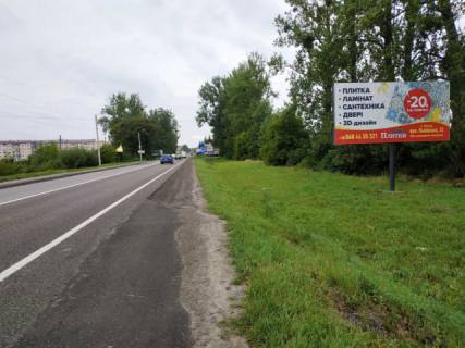 Billboard A in Soposhin, 6x3м.  s. Soposin, vizd v m. Zovkva, trasa L'viv- Rava-Rus'ka (M-09), na kordon z Pol'seu (m.Rava- Rus'ka), na m. Cervonograd, porad AZK WOG, na ATB, pisohidnij perehid svitlofor, zupinka grom. transportu Photo 1