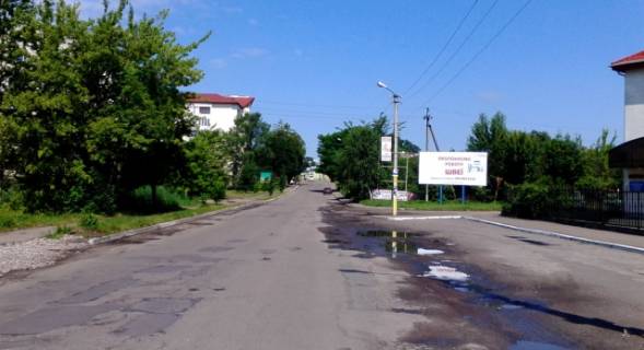 Billboard A in Zhovkva, 6x3м.  m. Zovkva, st. L'vivs'ka, 47A (fond zanatosti, zupinka, torg.centr "Rosana") Photo 1