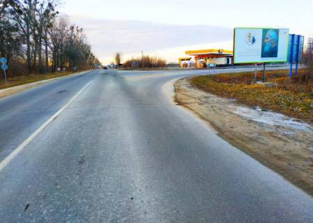 Billboard A in Zhovkva m. Zovkva, Viizd na miznarodnu trasu L'viv - Rava-Rus'ka, st. Ravs'ka+ AZK BRSM + zovta vitrozahisna luminescentna ramka Photo 1