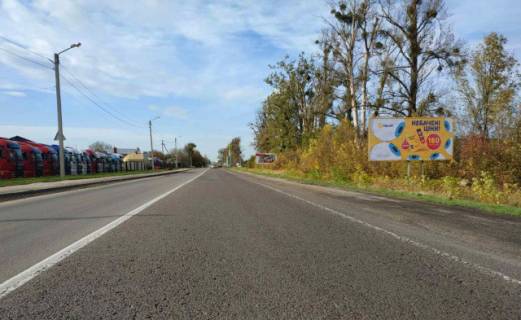 Billboard A in Soposhin, 6x3м.  с. Сопошин, вїзд в м. Жовква, траса Львів- Рава-Руська (М-09), на кордон з Польщею (м.Рава- Руська), на м. Червоноград, на АЗК WOG, на АТБ Photo 1