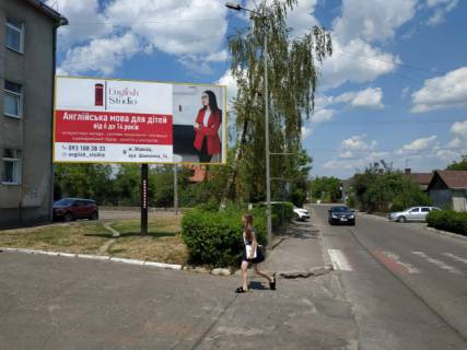 Billboard B in Zhovkva, 6x3м.  m. Zovkva, st. L'vivs'ka, 15, porad poliklinika, skola mistectv, pisohidnij perehid, ves' ruh trasportu na avtostanciu, bazar, cudova vidimist' Photo 1