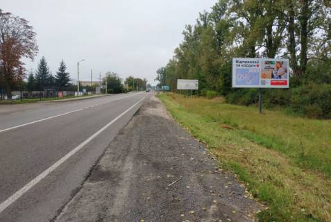 Billboard A in Soposhin, 6x3м.  с. Сопошин, вїзд в м. Жовква, траса Львів- Рава-Руська (М-09), на кордон з Польщею (м.Рава- Руська), на м. Червоноград, поряд АЗК WOG, на АТБ, пішохідний перехід світлофор, зупинка гром. транспорту Photo 1