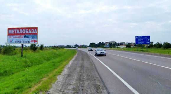 Billboard B in Busk, 6x3м.  m. Bus'k, central'nij vizd v m. Bus'k z storoni L'vova,  na m. Krasne, m.Brodi, trasa L'viv - Kiiv (E-40) + zovta vitrozahisna luminescentna ramka, na AZK "OKKO" Photo 1