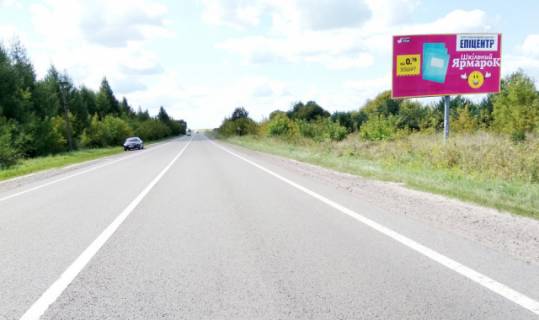 Billboard A in Radekhiv, 6x3м.  m. Radehiv, st. L'vivs'ka, 80, viizd z mista v napramku m. L'viv, m. Kamanka - Buz'ka, trasa L'viv - Luc'k (N-17) + AZK + zovta vitrozahisna luminescentna ramka + visoka konstrukcia Photo 1