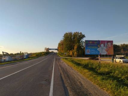 Billboard A in Lviv route, 6x3м.  vizd v m. L'viv z storoni kordonu (m.Rava-Rus'ka), na avtomijku Lux Wash, na got. Varsava, trasa L'viv- Rava-Rus'ka (M-09), na AZK WOG, zovta vitrozahisna luminescentna ramka Photo 1