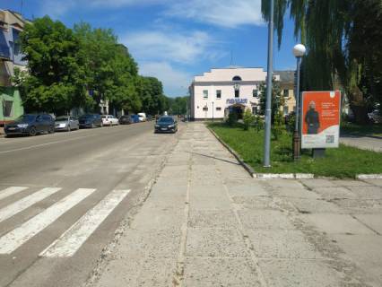 Citylight A in Mykolayiv (Lviv region), 1.8м.x1.2м.  m. Mikolaiv, st. L'vivs'ka/ pl. Rinok, pam. T.G. Sevcenku, Policia, Osadbank, Evromarket, Nas Kraj, Kopijocka ta in. Photo 1