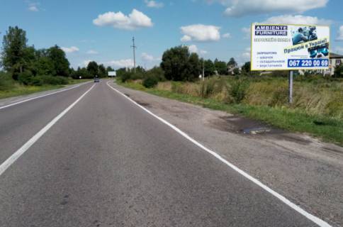 Billboard A in Kamyanka-Buzka, 6x3м.  vizd v m. Kam'anka - Buz'ka z napramku m. L'vova, trasa L'viv-Luc'k (N-17) na m. Radehiv, m. Dobrotvir, m. Gorohiv, m. Luc'k + AZK WOG + zovta vitrozahisna luminescentna ramka + visoka konstrukcia Photo 1