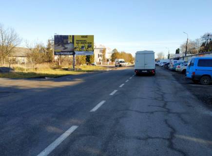 Billboard B in Busk, 6x3м.  м. Буськ, вул. Львівська, 73, на центр, пішохідний перехід, поряд районна лікарня, зупинка гром. транспорту, великий базар Photo 1