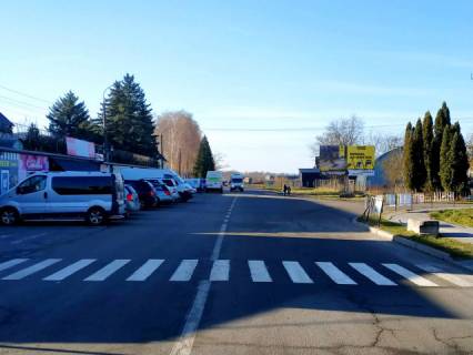 Billboard A in Busk, 6x3м.  м. Буськ, вул. Львівська, 73, виїзд з центру, пішохідний перехід, поряд районна лікарня, зупинка гром. транспорту, великий базар, на АТБ Photo 1