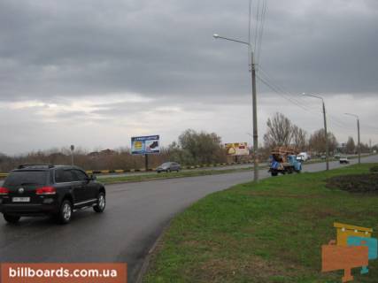 Billboard B in Zaporizhzhya, 3x6  093_Zaporoz'e_av. Inzenera Preobrazenskogo /av.Ubilejnyj, krug, ot centra (radom sm AMSTOR) Photo 1