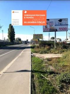 Billboard A in Svyatopetrivske, 3x6  st.Kievs'ka, pered povorot na Svatopetrovs'ke, centr, na Boarku Photo 1