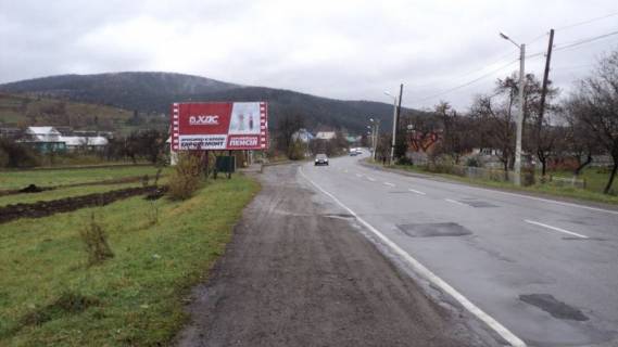 Billboard B in Yaremche, 3x6  Trasa N-09 Mukacevo-L'viv, viizd z mista v storonu Ivano-Fr, bila avtozupinki Dora-2, napramok ruhu na Ivano-Frankivs'k Photo 1
