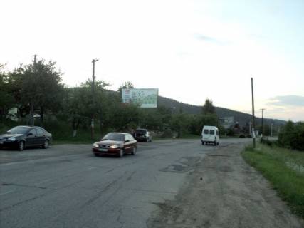 Billboard B in Yaremche, 3x6  Trasa N-09 Mukacevo-L'viv, viizd z mista v storonu Ivano-Fr, pisla kam`anim znakom Aremce, napramok ruhu na Ivano-Frankivs'k Photo 1
