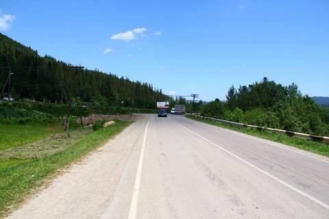 Billboard B in Mykulychyn, 3x6  Trasa N-09 Mukacevo-L'viv, 500 metriv pered kolibi Gostinna Hata, gazovou zapravkou Kalan, 700 m pered AZS UkrNafta, napramok ruhu na Bukovel' Photo 1