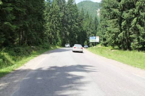 Billboard A in Bukovel, 3x6  Trasa N-09 Mukacevo-L'viv, doroga na Bukovel' (s.Polanica), 450 m pisla povorotu z trasi, napramok ruhu na Bukovel' Photo 1