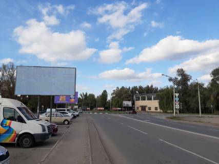 Billboard B in Krivy Rig st. Kuprina, 15. rinok "Zmicka", napramok ruhu z pl. Vizvolenna do Kirovograds'kogo sose. Zupinka gromads'kogo transportu Zmicka, Avia koledz, magazini, kafe. Cervona linia ruhu transportu. Photo 1