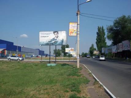 Billboard B in Krivy Rig st. Bikova, 33. zaizd do stoanki TC "Epicentr", TC Metro, AZS Sentoza i RLS). Napramok ruhu transportu vid pl.Pola do TC Epicentr, TC Metro ta ob'izdnoi. Photo 1