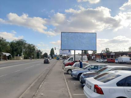 Billboard A in Krivy Rig st. Kuprina, 15. rinok "Zmicka", napramok ruhu do pl. Vizvolenna. Zupinka gromads'kogo transportu Zmicka, Avia koledz, magazini, kafe. Cervona linia ruhu transportu. Photo 1