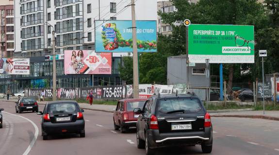 Billboard A in Ivano-Frankivsk, Щит 3x6  Stusa st. / Ivasuka st., rinok, magazini, doroga do z / m "Sofiivka", do centru Photo 1