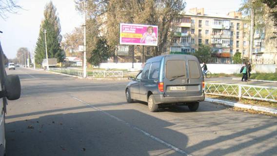 Billboard A in Uzin, Щит 3x6  Aviatoriv st., 59, centr, bila kafe ta kinoteatru Photo 1