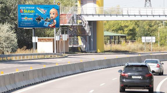 Billboard B in Kyiv, Щит 3x6  Dniprovs'ke sose, v napramku do Kieva, pered KPP, pered pisohidnim mostom (zliva) Photo 1