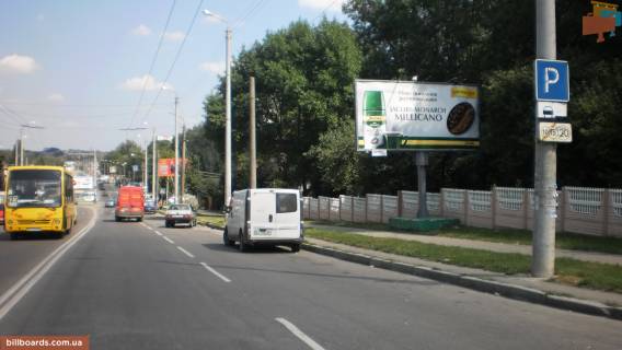 Billboard A in Khmelnitsky, Щит 3x6  L'vivs'ke sose, bila samogo velikogo optovogo rinku Zahidnoi Ukraini, avtostoanki, z centru! Uvaga, rozmir 6010h3020! Photo 1