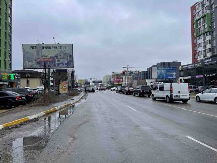 Billboard B in Kryukivshchyna, 3х6  St. Vasila Stusa , vozle ZK Pionerskij, vozle makdonal'ds , sil'po na svetofore Photo 1