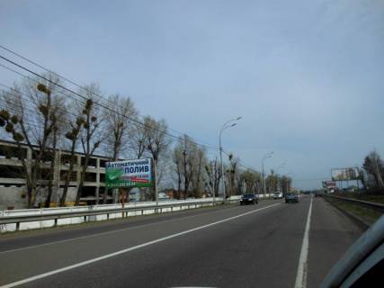 Billboard B in Vishgorod Trasa "Kiiv-Ivankiv-Ovruc", R-02 km 20+ 500 livo, s. Novi Petrivci,  povorot na na kompleks "Mezigir'a" Photo 1