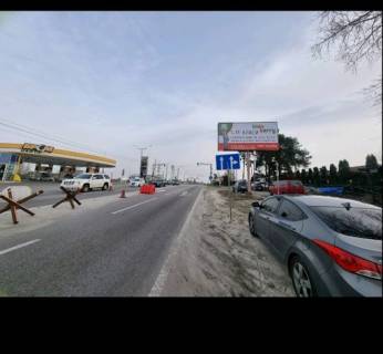 Billboard A in Novi Petrivtsi Trasa "Kiiv-Ivankiv-Ovruc", R-02 km 20+ 500 livo, s. Novi Petrivci,  povorot na na kompleks "Mezigir'a" Photo 1
