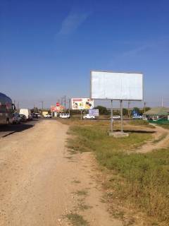 Billboard A in Velikodolinske, А  Velikodolins'ke povorot na Cornomors'k transport pramue z Ovidiopola v Odesu (probka pered povorotom na Cornomors'k) Photo 1