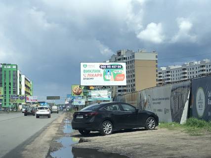 Billboard A in Vishnev, Board 3x6м  st. V. Stusa, 46/st. Osviti, zaizd do ZK "Akvareli-2", 100m do "Novus", ZK "Evropejs'ke Misto", ZK "Pioners'kij", v bik m. Kiiv Photo 1
