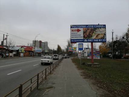 Billboard A in Vishgorod, Board 3x6м  st. Naberezna, povorot na st. Promislova, bila zavodu ZBMK, zupinka, restorn "Gals", mag "Budivel'nij", restoran "Kozac'ki zabavi", cerez 75m pisla AZS "WOG", z Kieva  Photo 1