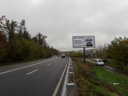 Billboard A in Kyiv, Board 3x6м  Nova Okruzna doroga -Gostomel'-Irpin'-Buca (Avtodoroga R-30)/ st. Lisna, "Osadbank", STO "BMW VAG - Fly Motors", 536 m. vid viizdu z st. Naumova na Novu Irpins'ku kil'cevu dorogu, v napramku m. Kieva Photo 1