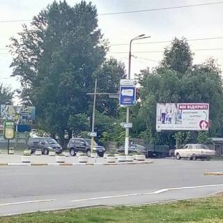 Billboard B in Svyatopetrivske st. Kiivs'ka/ st. Central'na, velike perehrestta, poruc "SINEVO", "CAR SERVICE", 300m do "ATB-Market", v napramku m. Kieva, m. Visnevogo Photo 1