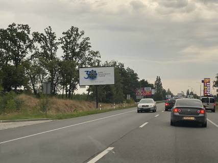 Billboard B in Vorzel, Board 3x6м  st. Kovel's'ka, zaizd na AZS "BRSM", pered povorotom na  ZK "Forest Land" st. I. Vigovs'kogo, 500m do Rink "Bucans'kij", Restoran "Hatinka Pekara", Avtodoroga M-07 Kiiv-Kovel'-Agodin, napramok v m. Borodanku z m. Kiiv Photo 1