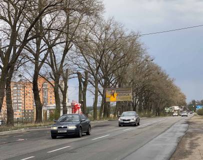 Billboard B in Bilogorodka, Board 3x6м  вул. Білогородська, зупинка, заїзд у ЖК "Пеший Парквий", поруч "Ресторан  "7 Шашличок",  200м до "АТБ Маркет" зупинка, "IQ Pizza", а/д Р-04 Київ-Фастів-Звенигородка 8+800км., в бік м. Вишневе, м. Київ Photo 1