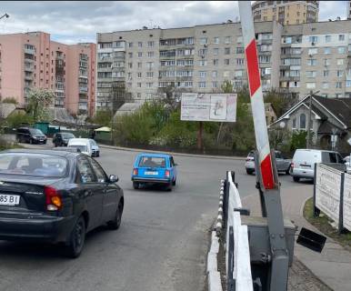 Billboard A in Vishnev, Board 3x6м  ЖД ПЕРЕЇЗД, перехрестя вул. Л. Українки/вул. В. Чорновола,  поруч "ТОВ ЖУЛЯНИЛІСБУД", "ЗІМ 1, Компанія", "СПМК ШЛЯХОВИК", навпроти зупинка "Л. Українки", ЖК "Чорновола", "Food Market",  "Гурман",  в бік центру міста Photo 1