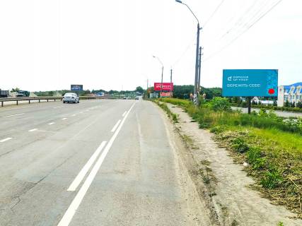 Billboard A in Khmelnitsky, 3x6  Kam'anec'ke sose, bila aeroportu, TRC "Podilla Karavan", (2) Photo 1