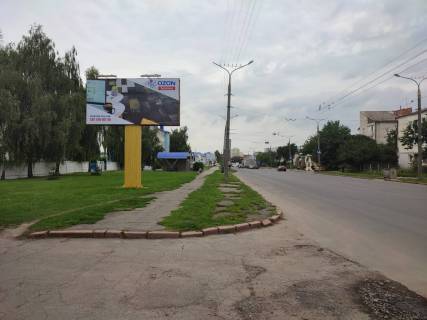 Billboard B in Lutsk st. Dubnivs'ka 28 (vizd v misto, bila zupinki Luc'kvodokanal, poruc vijs'kovij licej) Photo 1