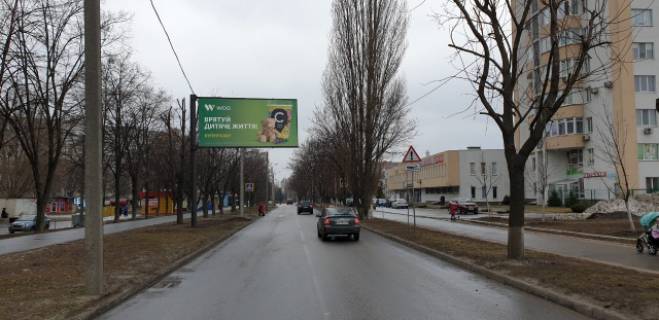 Billboard B in Kharkiv, 6x3  Olimpijs'ka st.,21 (Poliklinika No5, SM "Brusnicka") ,v napramku pr-ta L'va Landau Photo 1