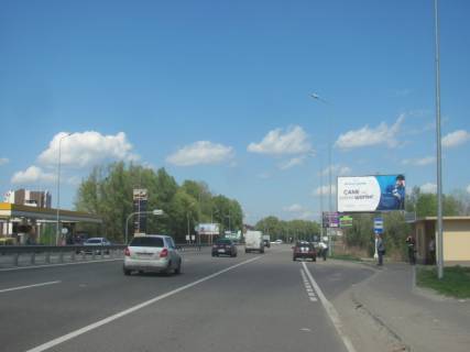 Billboard A in Khodosivka, 6x3  Novoobuhivs'ka trasa (Dniprovs'ke sose), v napramku m.Kiiv, 150m pisla TC "Megamarket", navproti zapravki BRSM, 7km+200m Photo 1