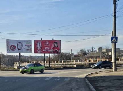 Billboard A in Kropyvnytskyi (Kirovograd), 3x6  Vasilivs'kij prov. - Ostrovs'kogo st. (po centru) Photo 1