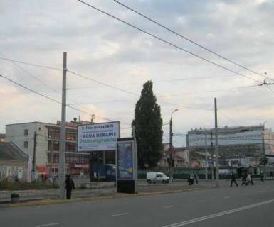 Billboard B in Sumi, 3x6  1-a Naberezna r. Strilki st. - Surogins'kij prov. (9-go Travna prov.) Photo 1