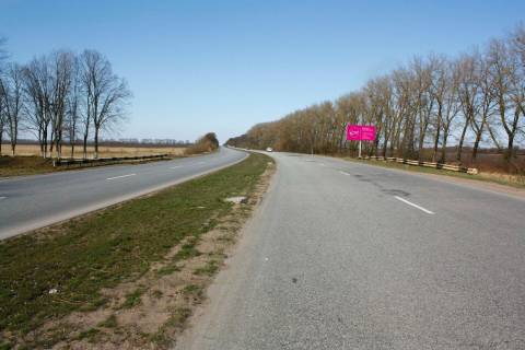 Billboard A in Zhytomyr, 3x6  trasa Zitomir-  Mogiliv- Podil's'kij: M-21 22 km 700m (livo) Photo 1