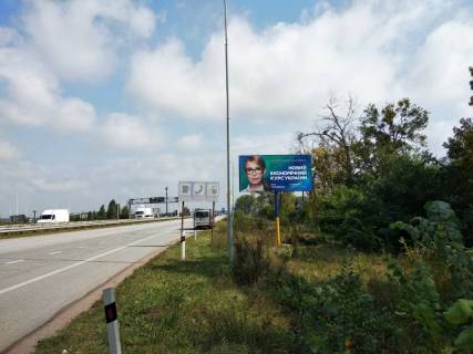 Billboard A in Zhytomyr, 3x6  Trasa Zitomir-Kiiv. Pered zapravkou OKKO, napramok z Zitomira na Kiiv Photo 1