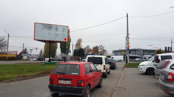 Billboard B in Khmelnitsky, 3*6  perehresta av.Miru-st.Trudova ta Vinnic'kogo sose. nepodalik: avtorinok, avtosaloni vsih vidomih brendiv, kil'ka AZS, Avtovokzal No1 (do/vid centru) Photo 1